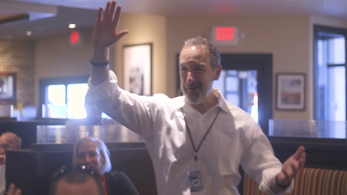 Jay energizing a room of business owners